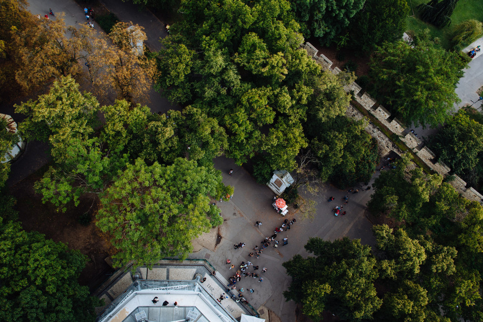 Top view of trees and people at Petrin Tower in Prague.